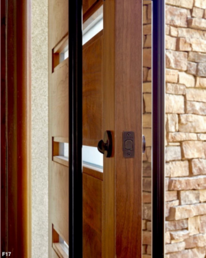 Oil Rubbed Bronze Round Emtek Deadbolt and 3ft Modern Pull Bar in Flat Black on a Lassen Pivot Door in Mahogany with frosted glass Oil Rubbed Bronze Round Emtek Deadbolt and 3ft Modern Pull Bar in Flat Black on a Lassen Pivot Door in Mahogany with frosted glass